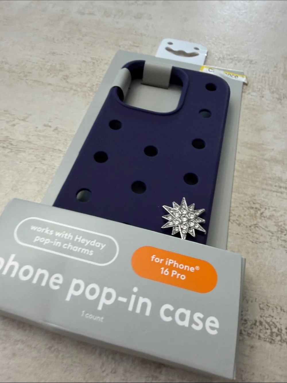 heyday Purple Pop-In Phone Case with Charm for iPhone 16 Pro. One charm